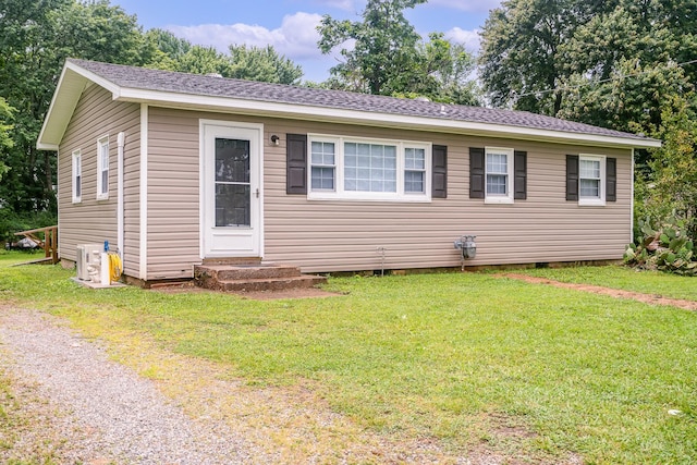 502 N Main St, Loretto, TN 38469 - view of front of home with a front lawn, crawl space, and roof with shingles