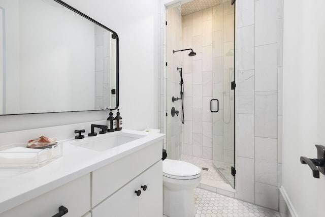 2410 Hidden River Ln, Franklin, TN 37069 - bathroom featuring vanity, a shower stall, and tile patterned flooring