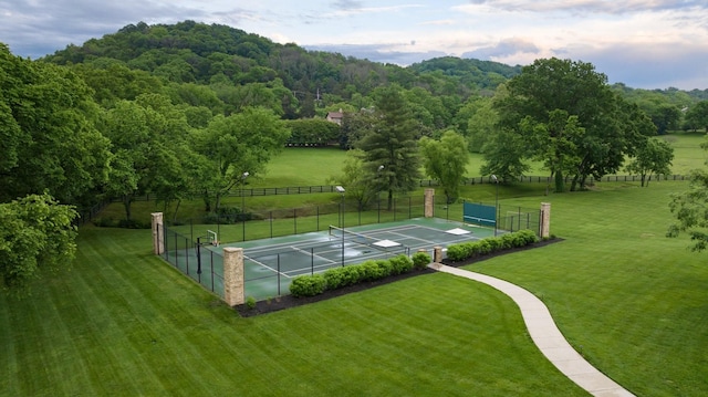 2410 Hidden River Ln, Franklin, TN 37069 - view of community featuring a tennis court and a wooded view