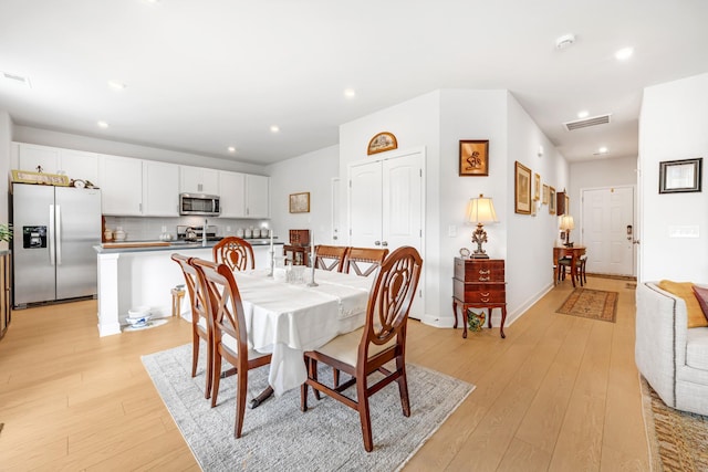 127 Millbrook Dr, Spring Hill, TN 37174 - dining area with light wood-type flooring and recessed lighting