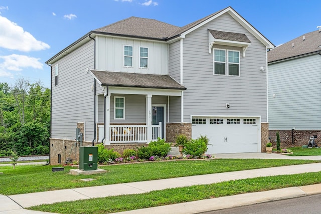 127 Millbrook Dr, Spring Hill, TN 37174 - craftsman inspired home with a porch, a garage, board and batten siding, a front yard, and driveway