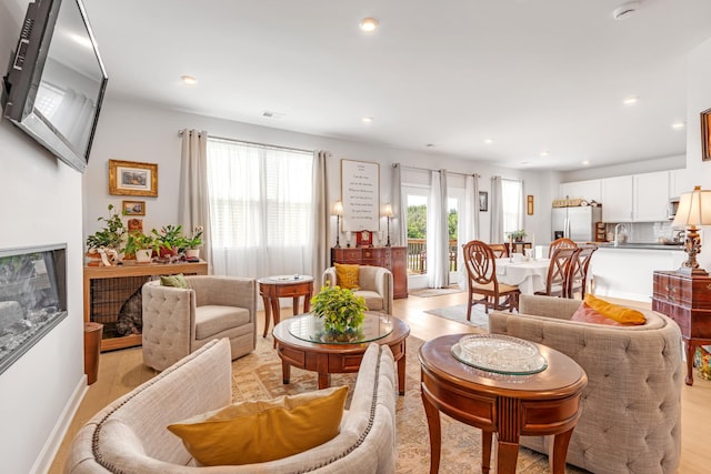 127 Millbrook Dr, Spring Hill, TN 37174 - living room featuring light wood-style floors and recessed lighting