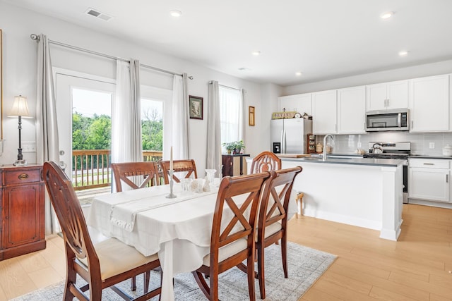 127 Millbrook Dr, Spring Hill, TN 37174 - dining area featuring plenty of natural light, light wood finished floors, and recessed lighting