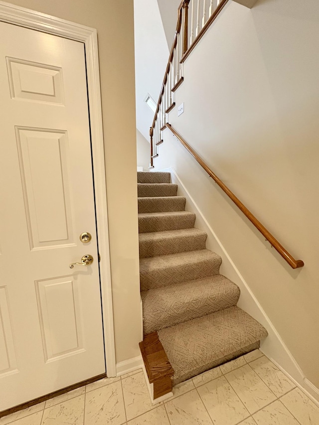 416 Barnes Dr, Lebanon, TN 37087 - stairs featuring marble look tile flooring