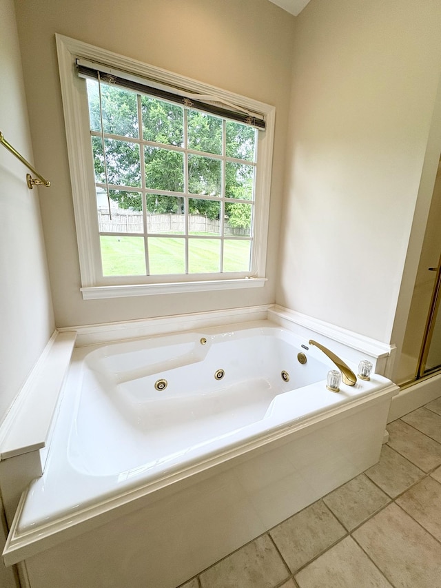 416 Barnes Dr, Lebanon, TN 37087 - full bath featuring healthy amount of natural light, tile patterned floors, and a whirlpool tub