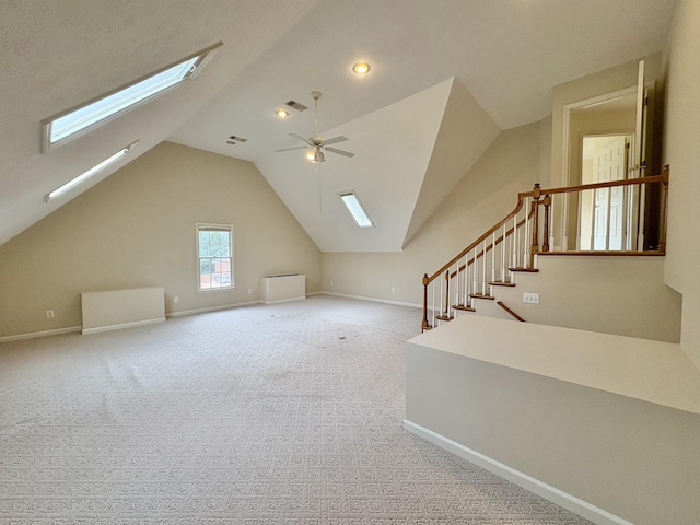 416 Barnes Dr, Lebanon, TN 37087 - additional living space with a skylight, vaulted ceiling, ceiling fan, carpet floors, and stairway