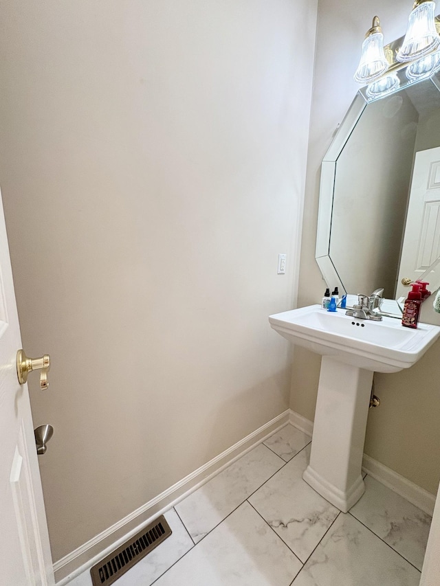 416 Barnes Dr, Lebanon, TN 37087 - bathroom featuring marble finish flooring and baseboards