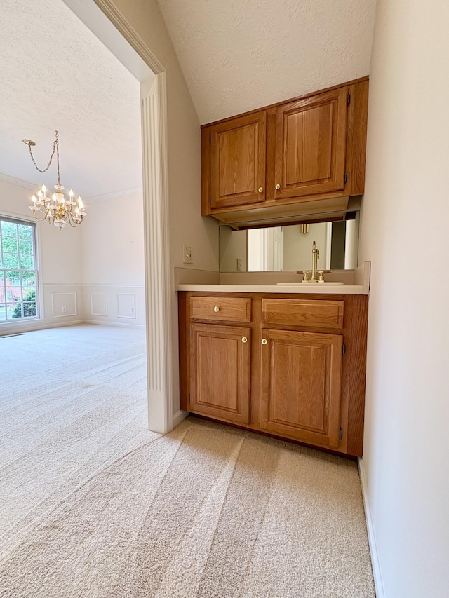 416 Barnes Dr, Lebanon, TN 37087 - bar featuring light carpet, a textured ceiling, a chandelier, and hanging light fixtures