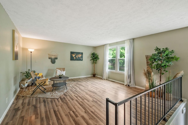 301 Panamint Dr, Antioch, TN 37013 - sitting room with a textured ceiling and wood finished floors