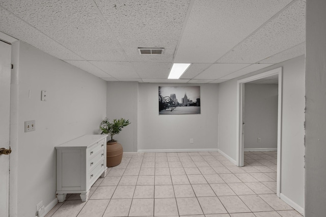 301 Panamint Dr, Antioch, TN 37013 - finished below grade area with a drop ceiling and light tile patterned flooring