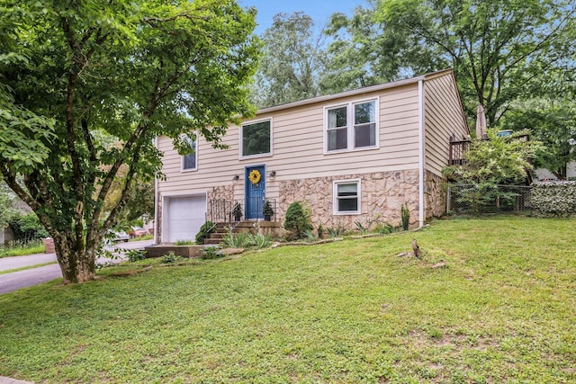 301 Panamint Dr, Antioch, TN 37013 - bi-level home with a garage and stone siding