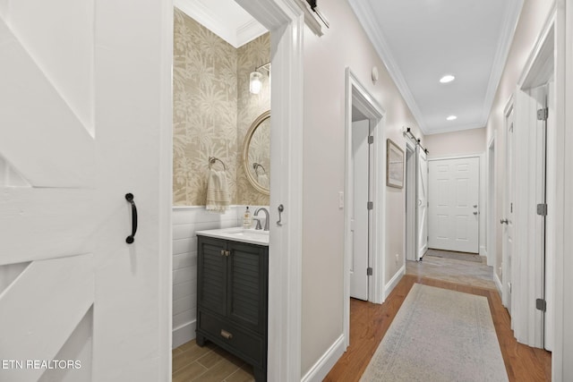 48 Riverside Dr, Oak Ridge, TN 37830 - bathroom featuring crown molding, vanity, wood finished floors, and recessed lighting