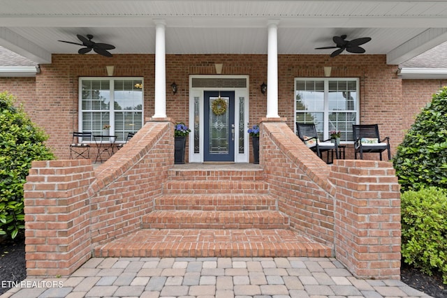 48 Riverside Dr, Oak Ridge, TN 37830 - doorway to property featuring a ceiling fan and brick siding