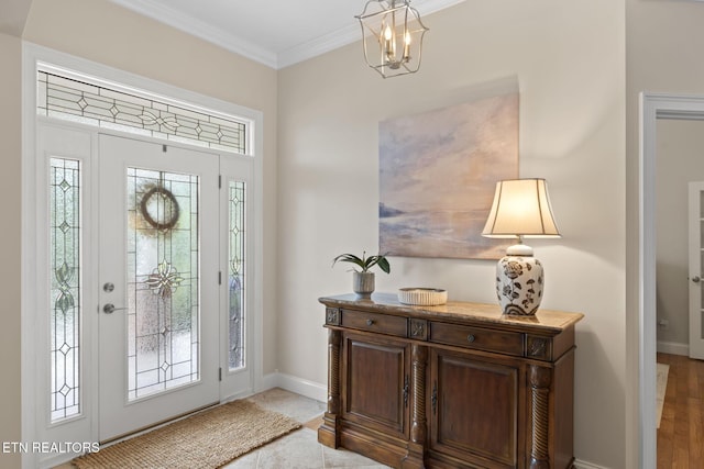 48 Riverside Dr, Oak Ridge, TN 37830 - foyer entrance featuring crown molding and a chandelier