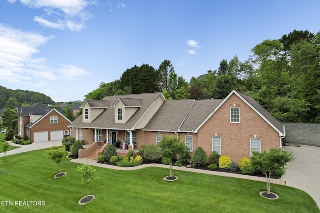 48 Riverside Dr, Oak Ridge, TN 37830 - view of front facade featuring brick siding and a front lawn
