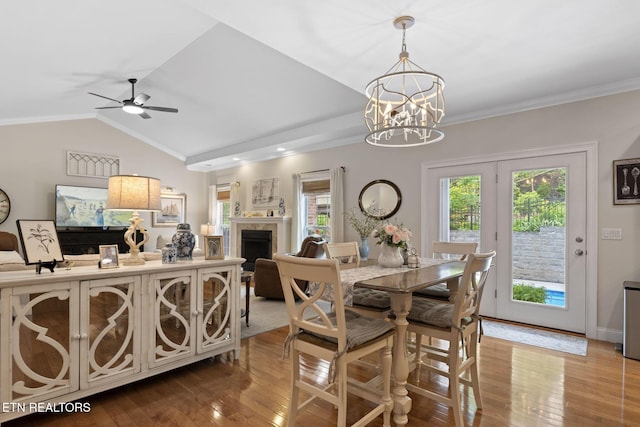 48 Riverside Dr, Oak Ridge, TN 37830 - dining room featuring wood-type flooring, a chandelier, ceiling fan, crown molding, and vaulted ceiling