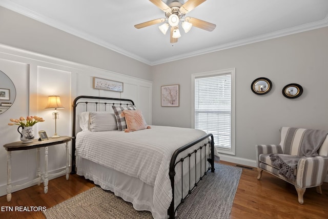 48 Riverside Dr, Oak Ridge, TN 37830 - bedroom featuring ornamental molding, wood finished floors, and ceiling fan