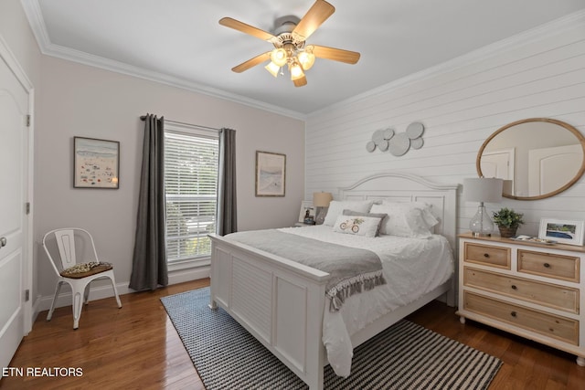 48 Riverside Dr, Oak Ridge, TN 37830 - bedroom with ornamental molding, dark wood-style flooring, ceiling fan, and wooden walls