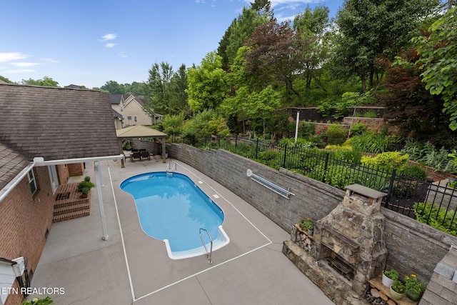 48 Riverside Dr, Oak Ridge, TN 37830 - view of swimming pool with a gazebo, a patio area, and a fenced backyard