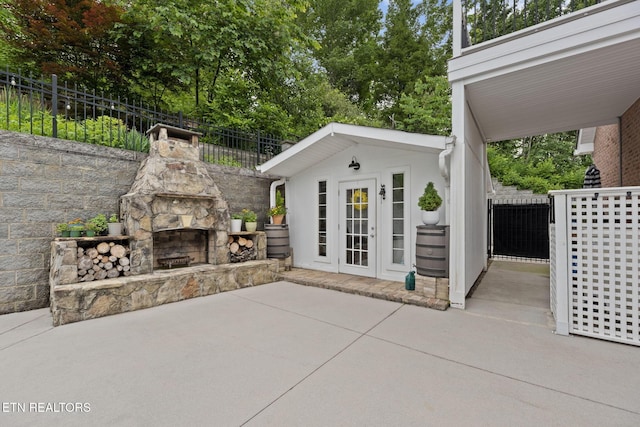 48 Riverside Dr, Oak Ridge, TN 37830 - view of patio with an outdoor stone fireplace