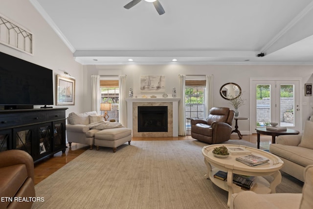 48 Riverside Dr, Oak Ridge, TN 37830 - living area with healthy amount of natural light, a tile fireplace, ceiling fan, and crown molding