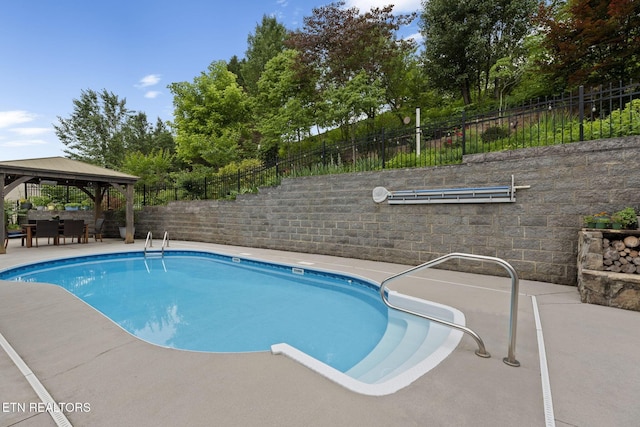 48 Riverside Dr, Oak Ridge, TN 37830 - view of swimming pool with a gazebo and a patio
