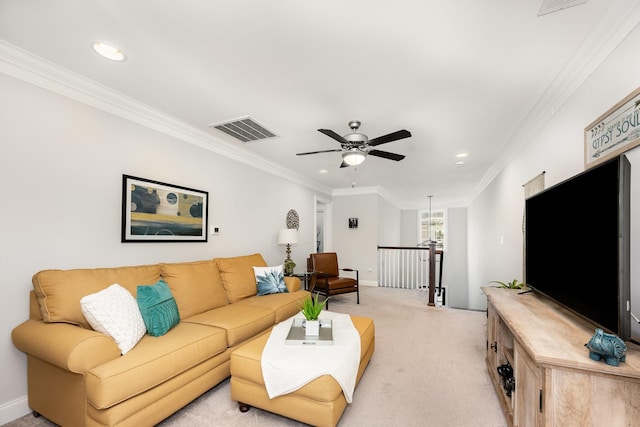 1055 Beckwith St, Franklin, TN 37064 - living area with crown molding, recessed lighting, ceiling fan, and light carpet