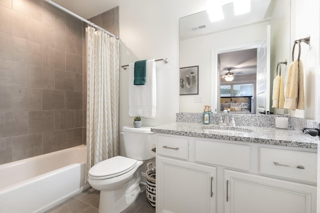 1055 Beckwith St, Franklin, TN 37064 - full bathroom with vanity, connected bathroom, shower / bath combo, a ceiling fan, and tile patterned floors