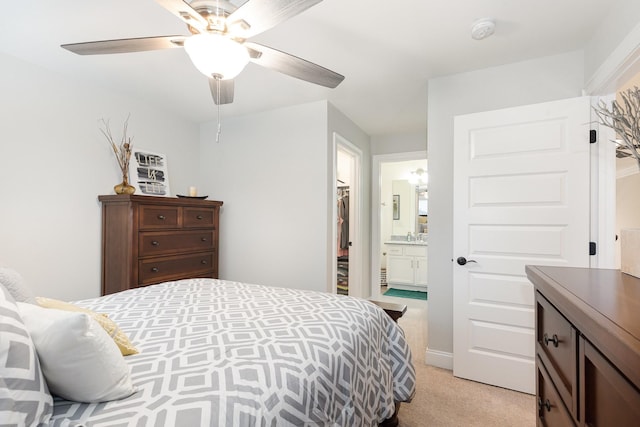 1055 Beckwith St, Franklin, TN 37064 - bedroom with light colored carpet, connected bathroom, and ceiling fan