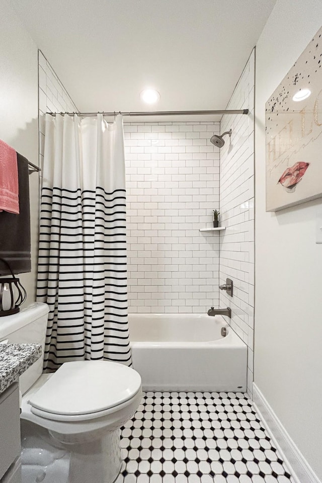 1055 Beckwith St, Franklin, TN 37064 - bathroom featuring tile patterned flooring, shower / bathtub combination with curtain, and vanity
