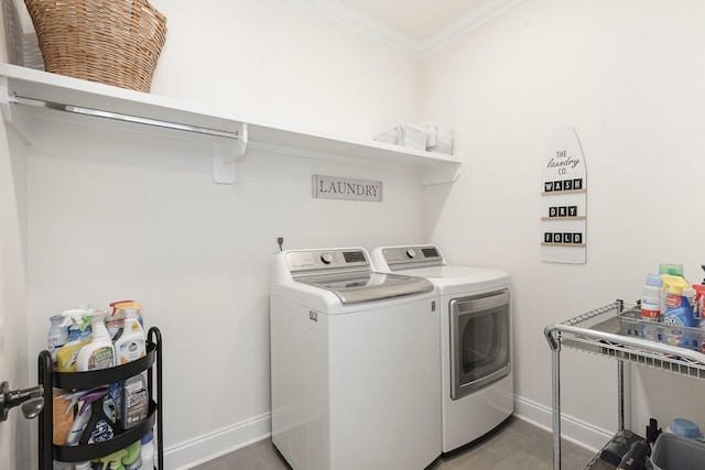 1055 Beckwith St, Franklin, TN 37064 - washroom with washer and clothes dryer and crown molding
