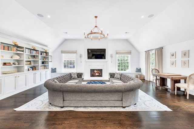 1932 Rosewood Valley Dr, Brentwood, TN 37027 - living area featuring lofted ceiling, a chandelier, a warm lit fireplace, dark wood-type flooring, and recessed lighting