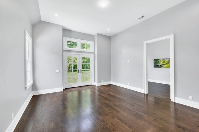 1932 Rosewood Valley Dr, Brentwood, TN 37027 - empty room with french doors, dark wood-type flooring, vaulted ceiling, and recessed lighting