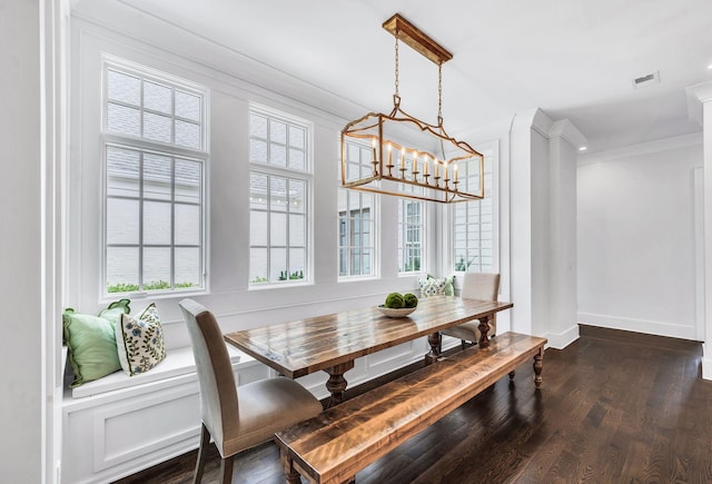 1932 Rosewood Valley Dr, Brentwood, TN 37027 - dining area with breakfast area, a chandelier, healthy amount of natural light, dark wood-type flooring, and crown molding