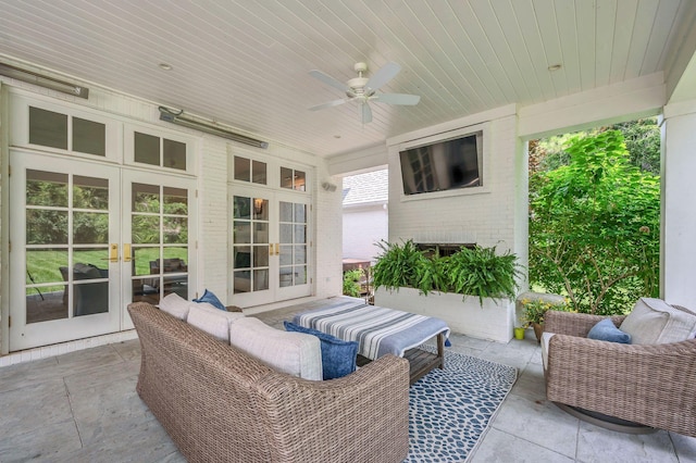 1932 Rosewood Valley Dr, Brentwood, TN 37027 - sunroom with french doors, a ceiling fan, and an outdoor living space with a fireplace