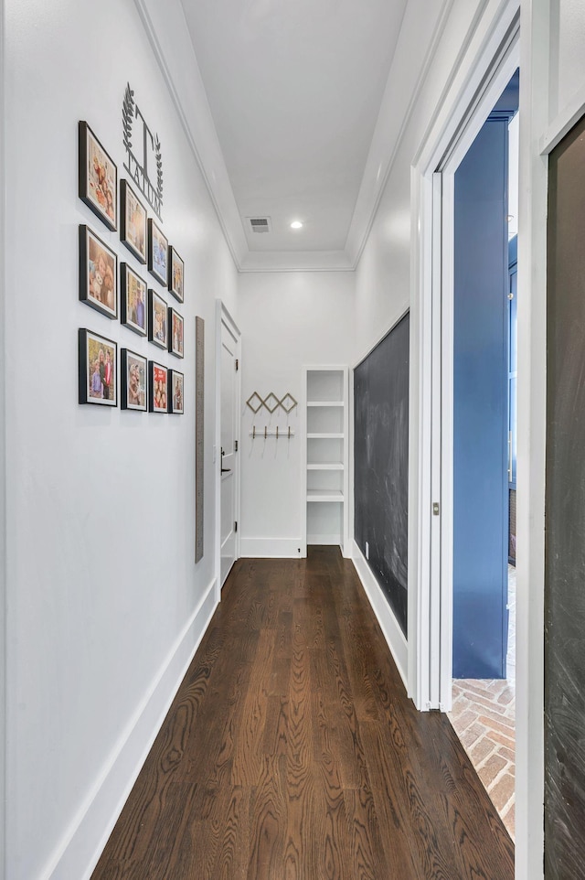 1932 Rosewood Valley Dr, Brentwood, TN 37027 - hall with ornamental molding, dark wood-type flooring, built in features, and recessed lighting