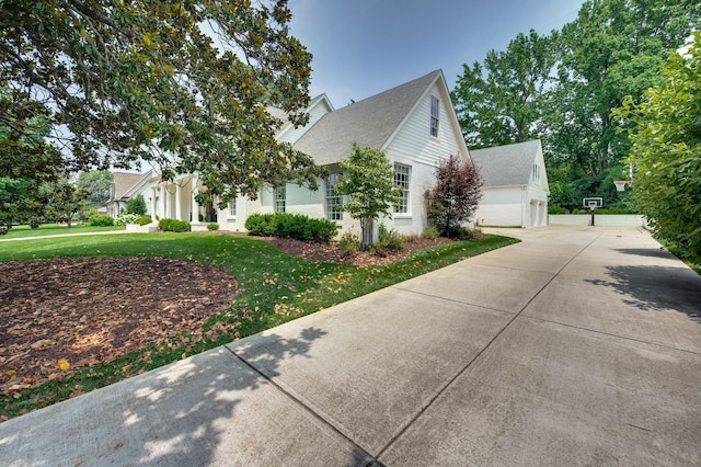 1932 Rosewood Valley Dr, Brentwood, TN 37027 - view of home's exterior with a lawn and roof with shingles