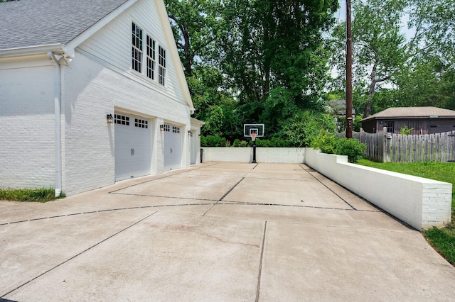 1932 Rosewood Valley Dr, Brentwood, TN 37027 - view of home's exterior featuring brick siding, driveway, a shingled roof, and a garage