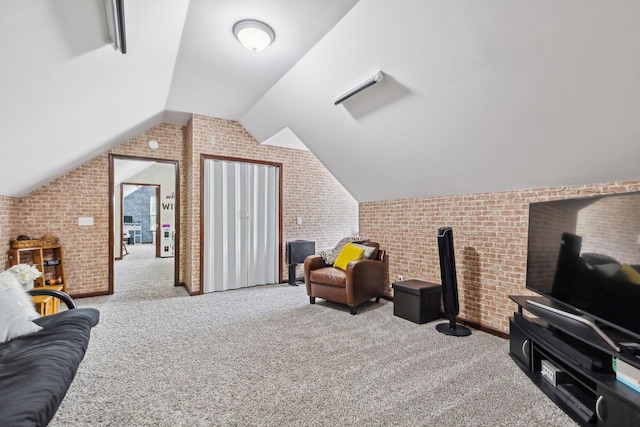 113 Beck Ct, Murfreesboro, TN 37128 - living area with brick wall, vaulted ceiling, and carpet flooring