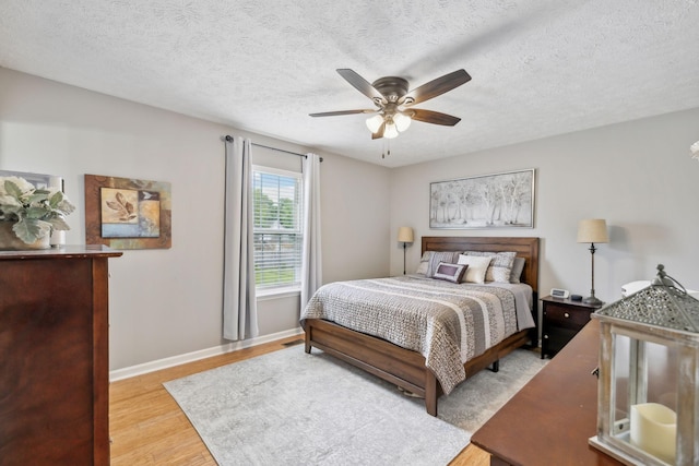 113 Beck Ct, Murfreesboro, TN 37128 - bedroom with light wood-style floors, a textured ceiling, and ceiling fan