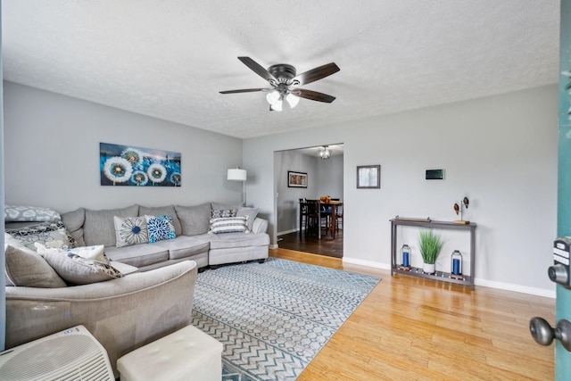 113 Beck Ct, Murfreesboro, TN 37128 - living room with a ceiling fan, wood finished floors, and a textured ceiling