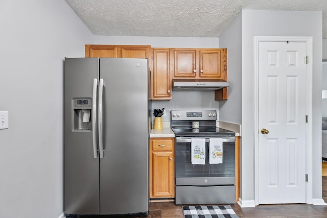 113 Beck Ct, Murfreesboro, TN 37128 - kitchen featuring appliances with stainless steel finishes, under cabinet range hood, dark wood-type flooring, light countertops, and a textured ceiling