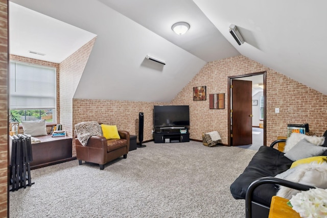 113 Beck Ct, Murfreesboro, TN 37128 - carpeted living room featuring brick wall, vaulted ceiling, and a fireplace