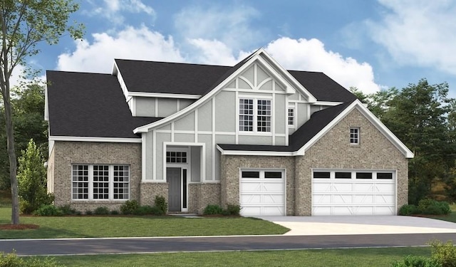 5969 Hunt Valley Dr, Spring Hill, TN 37174 - tudor-style house featuring an attached garage, brick siding, concrete driveway, a front yard, and stucco siding