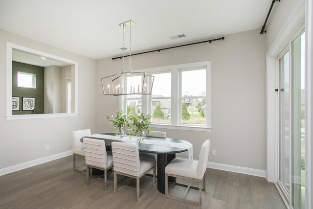 5969 Hunt Valley Dr, Spring Hill, TN 37174 - dining space with wood finished floors and a chandelier