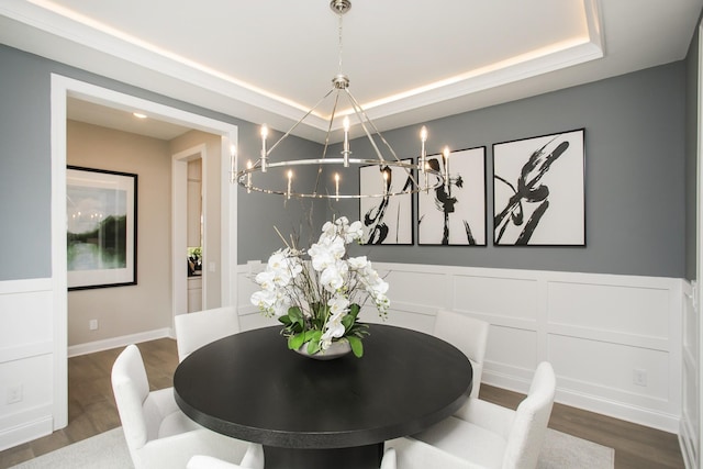 5969 Hunt Valley Dr, Spring Hill, TN 37174 - dining space featuring a chandelier, wood finished floors, a tray ceiling, wainscoting, and a decorative wall