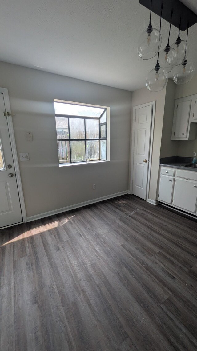 106 Beech Forge Dr, Antioch, TN 37013 - unfurnished dining area with dark wood-style flooring and a sink