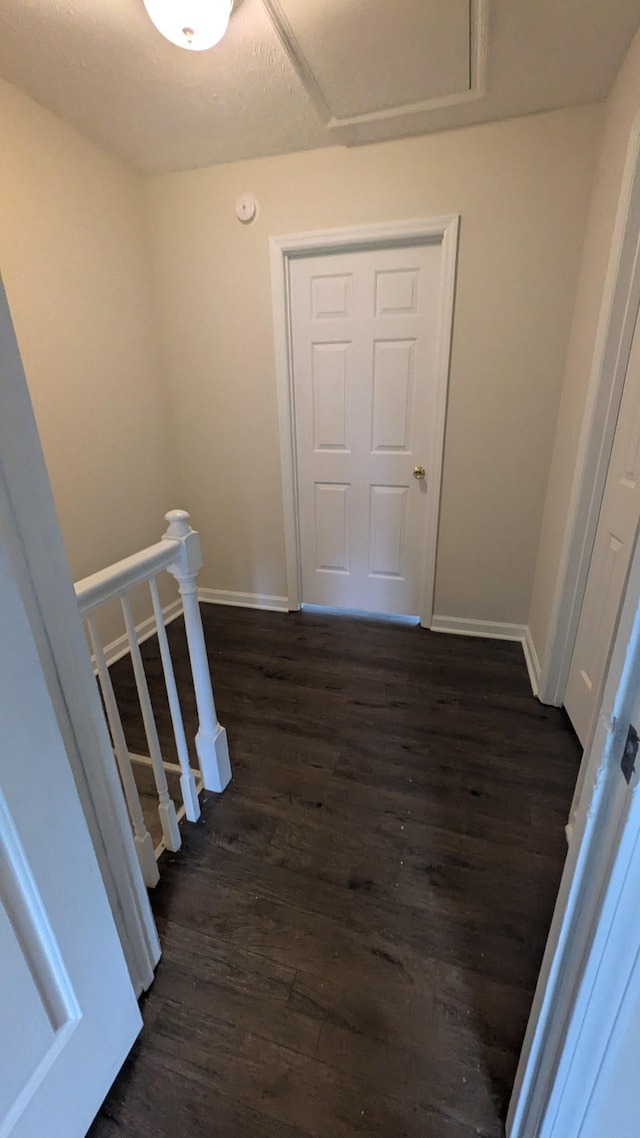 106 Beech Forge Dr, Antioch, TN 37013 - hall featuring an upstairs landing and dark wood finished floors
