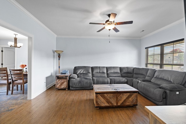 3228 Marion Davis Dr, Murfreesboro, TN 37129 - living room featuring wood finished floors, ceiling fan, ornamental molding, and a chandelier
