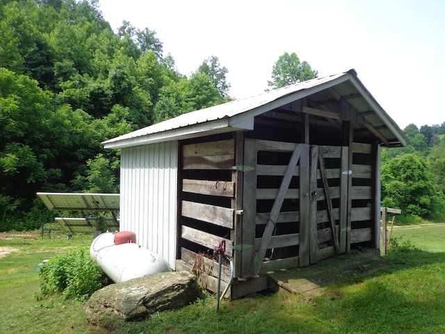 1342 Russell Creek Rd, Lobelville, TN 37097 - view of outdoor structure featuring a forest view